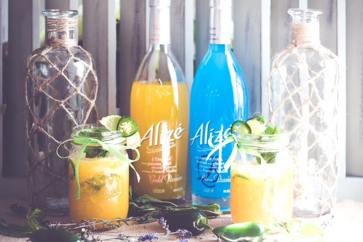 This Jalapeno Mango Mojioto is a sweet yet spicy cocktail guaranteed to be the hit at your next get together. #alizeincolor 