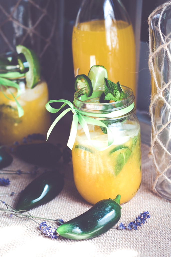 This Jalapeno Mango Mojioto is a sweet yet spicy cocktail guaranteed to be the hit at your next get together. #alizeincolor 