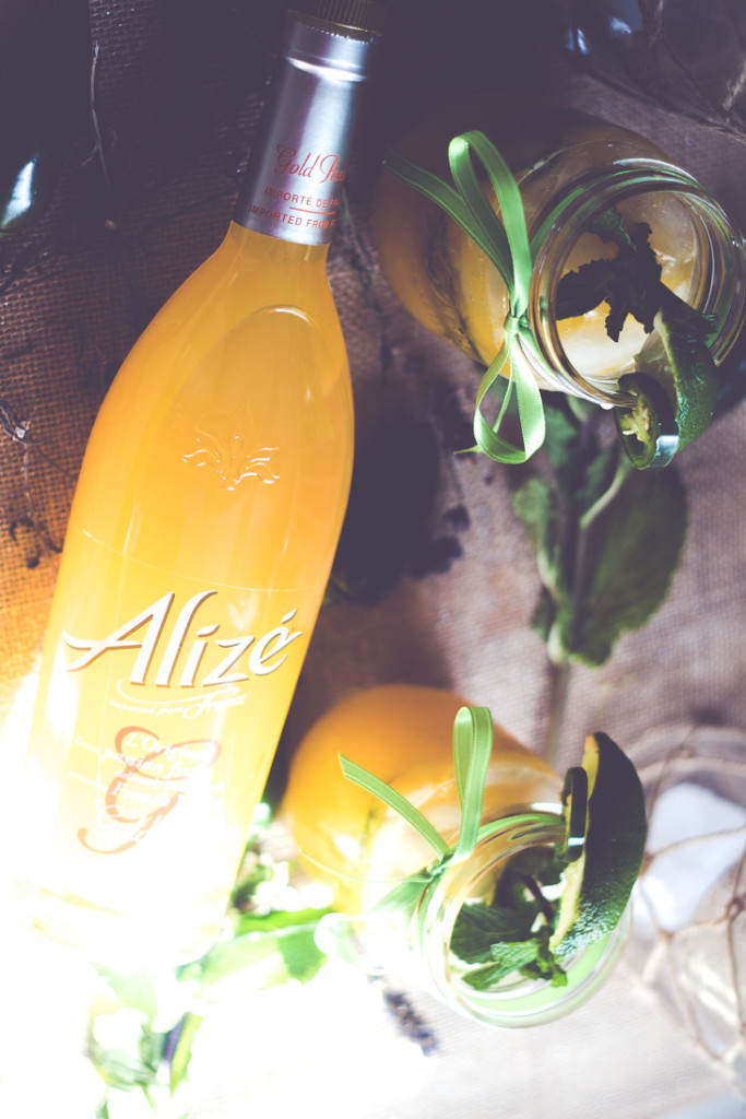 This Jalapeno Mango Mojioto is a sweet yet spicy cocktail guaranteed to be the hit at your next get together. #alizeincolor 