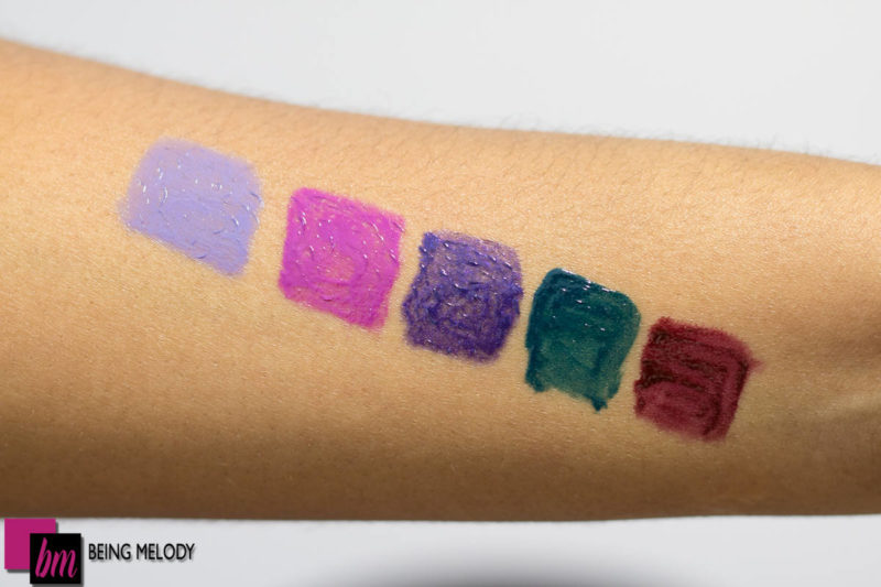 MAC VAMPLIFY LIPGLOSS swatches in Sway to the Sound, How Chic is This, She-Rebel, Acting on Impulse, and Modern Drama Swatches on Medium Brown Skin